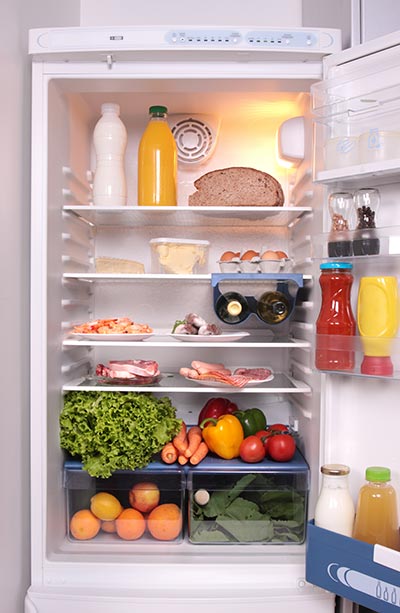 An open refrigerator filled with food