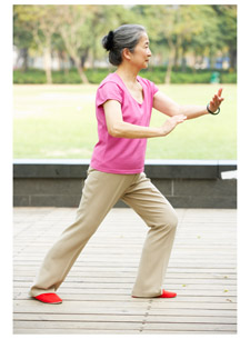 Woman in tai chi pose