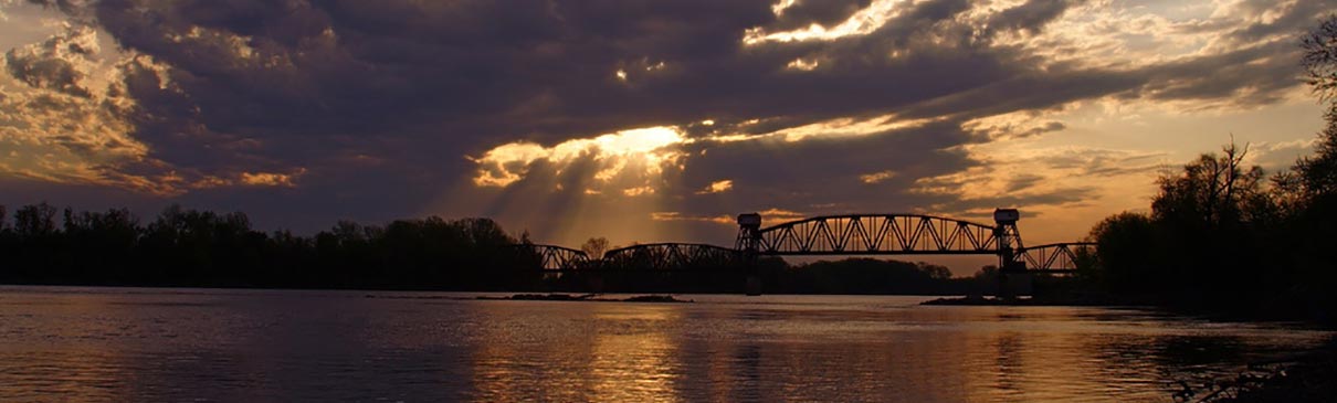 Missouri River bridge at sunset