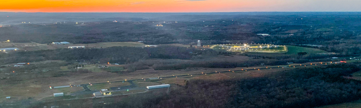 Arial photo of a rural airport at sunset