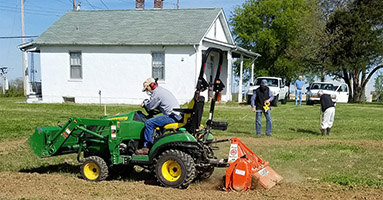 Master Gardener Tom Ruf tills ground on the site of a new community garden at St. John’s Lutheran Church in Arnold, Mo. Photo courtesy Jefferson County Master Gardeners.