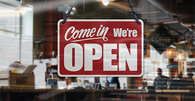 Open sign on window of a business