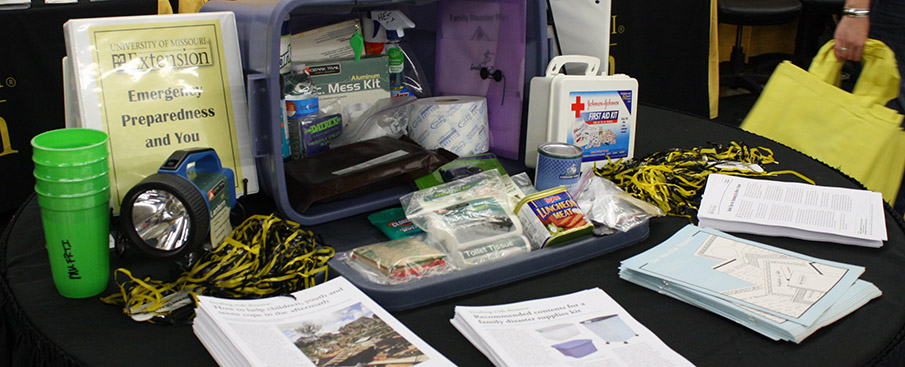 Items displayed on table that are needed for disaster kit