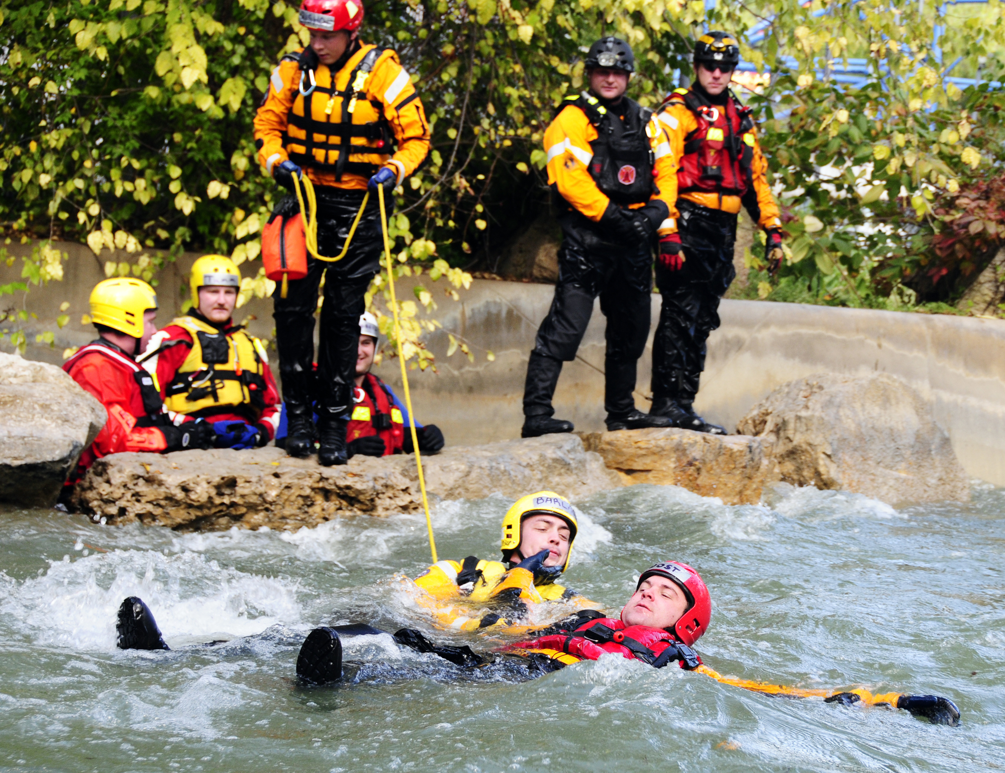 Open Rescuers learn how to handle victims adrift in a flooded waterway. Through proper use of rope they can tether themselves to rescuers on shore and retrieve a victim. 