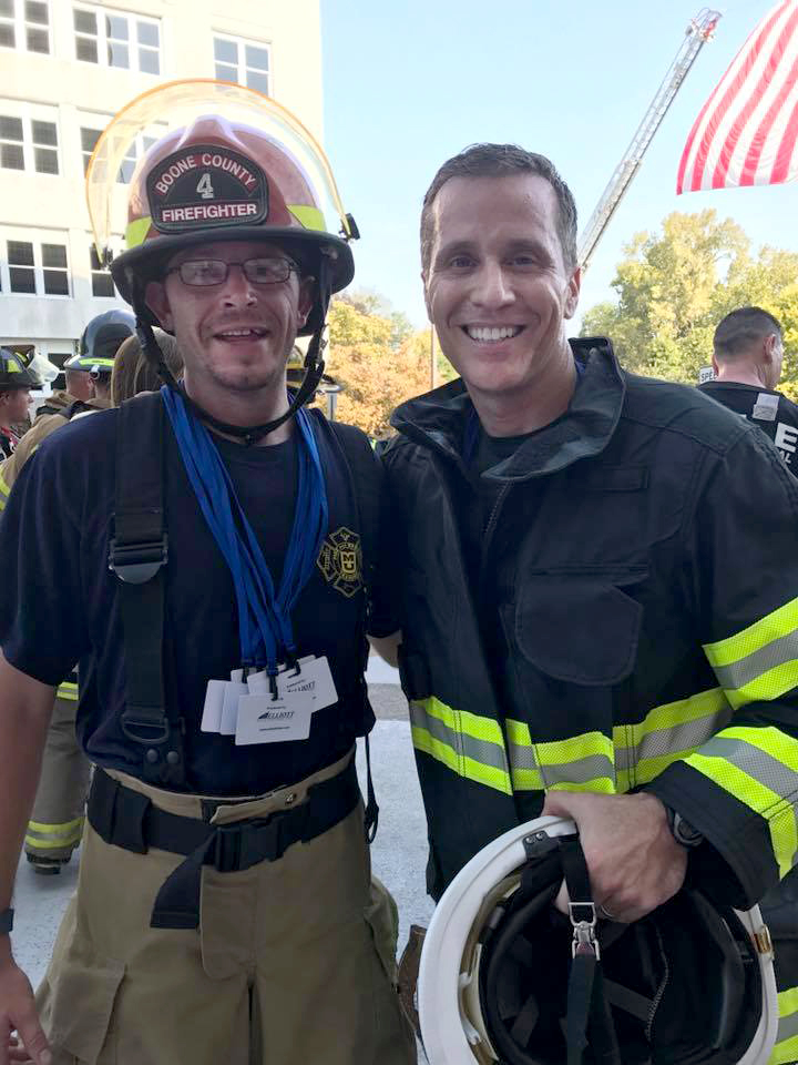 MU FRTI instructional support associate Tim Hartz, left, with Missouri Gov. Eric Greitens after completing the 9/11 Memorial Stair Climb.