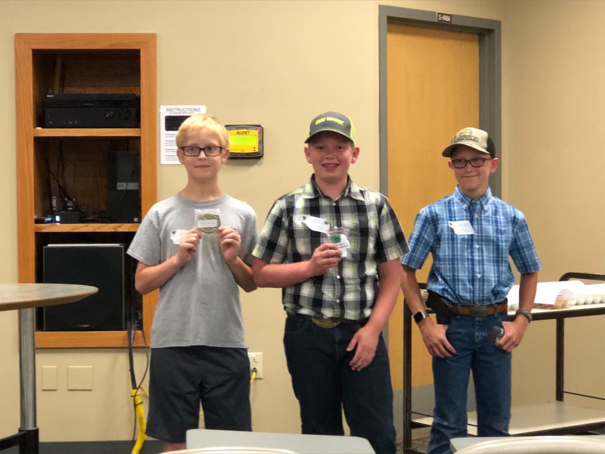 Top three juniors in the poultry judging contest, from left: Asher Ahrens and Hunter Aufdenberg, both of Cape Girardeau County, and Aiden Wimmer, Callaway County.