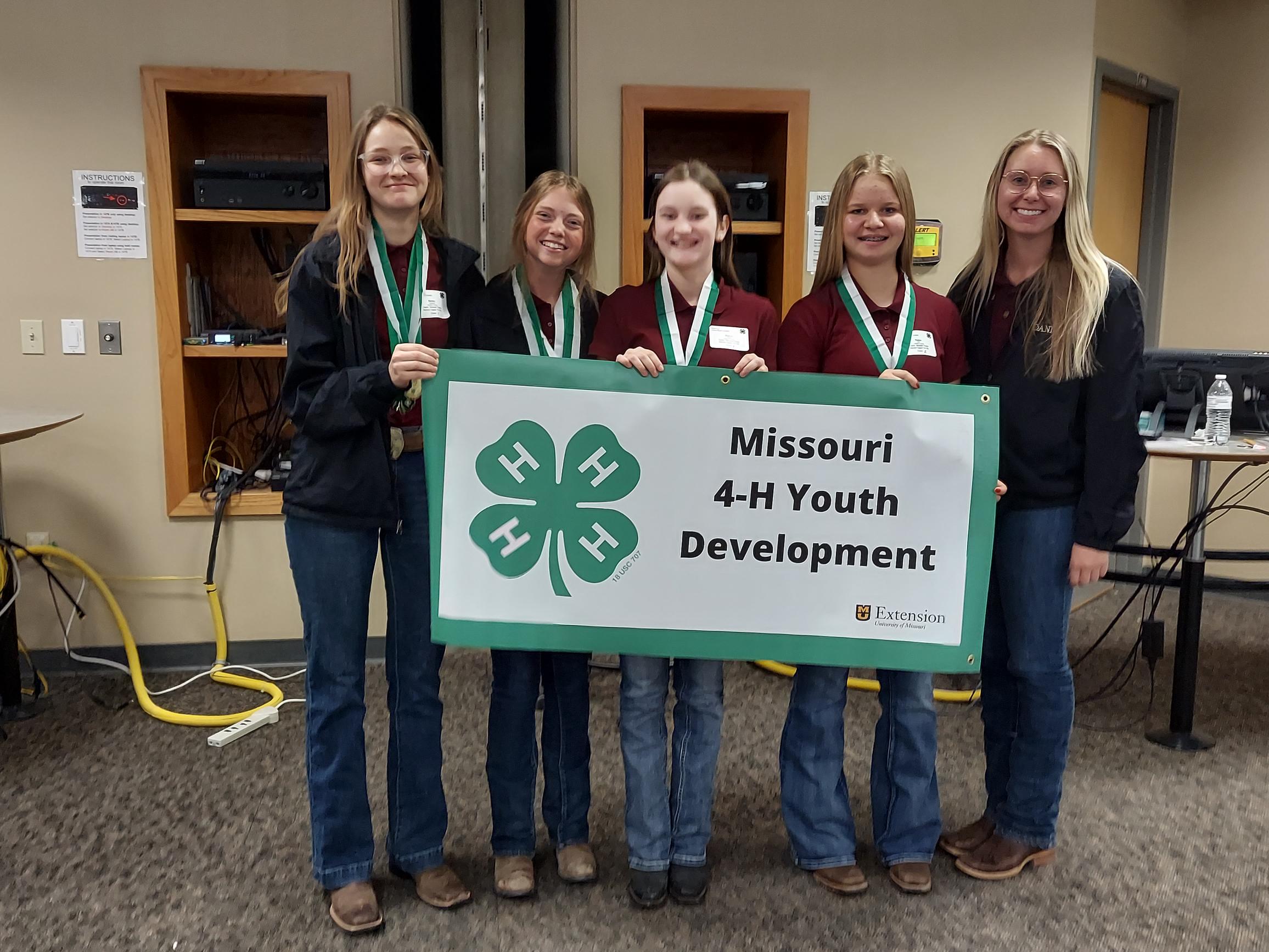 State 4-H Horse Bowl Contest top senior team (ages 14-18), representing Jackson County. From left, Bailey Spalding, Elizabeth Pruett, Alaina O'Dell, Kelsa Kirk and Dani Picard (coach).