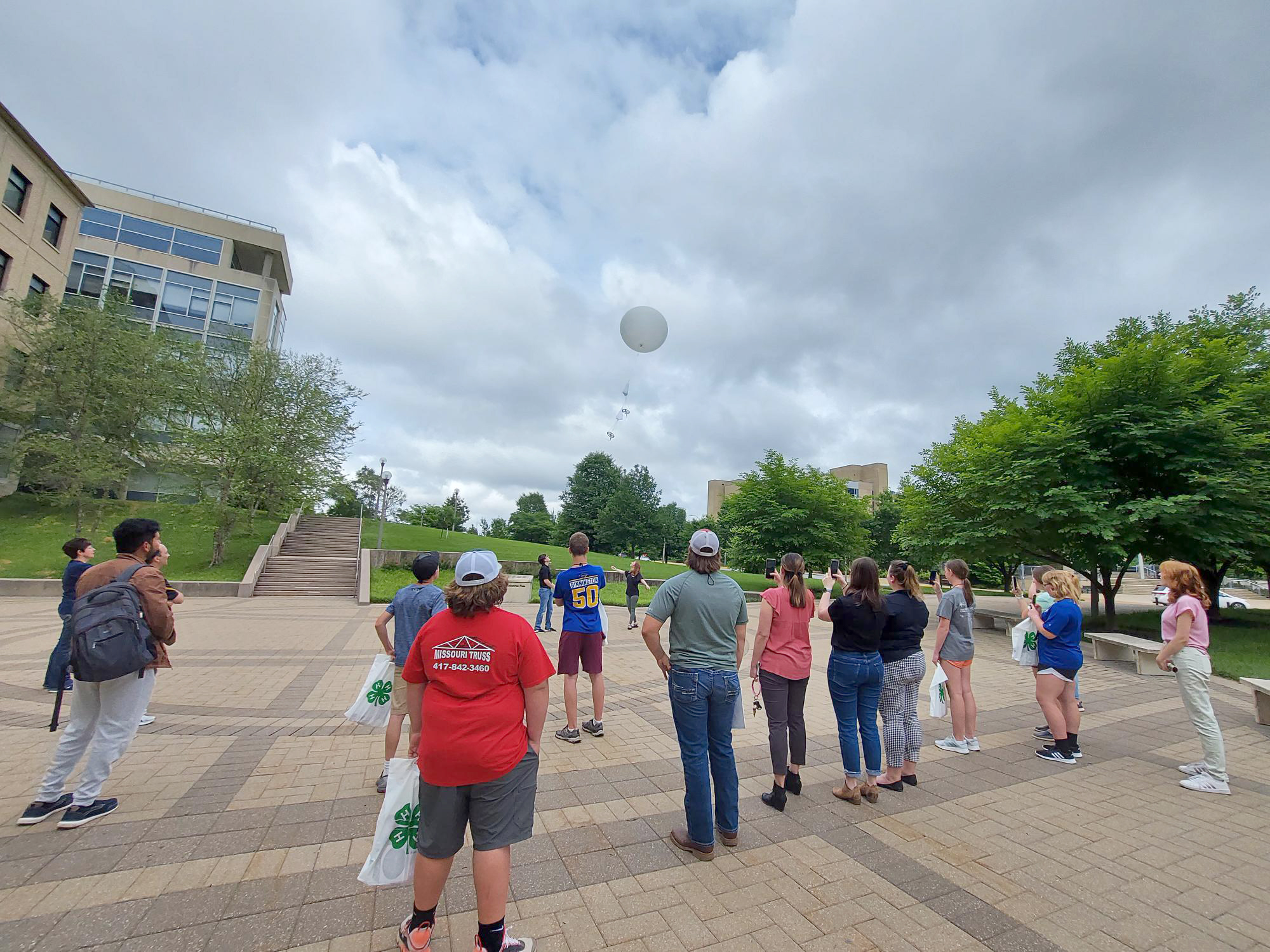 Youths launch a weather balloon with faculty and staff from the MU College of Agriculture, Food and Natural Resources’ Environmental Sciences program.