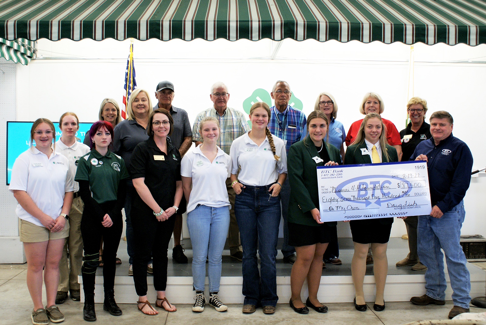 Open BTC Bank has made a five-year pledge of support to the Missouri 4-H Foundation for a youth financial education program called On My Own. BTC Bank President and CEO Doug Fish, front row, far right, presented a check to Missouri 4-H representatives Aug. 18 