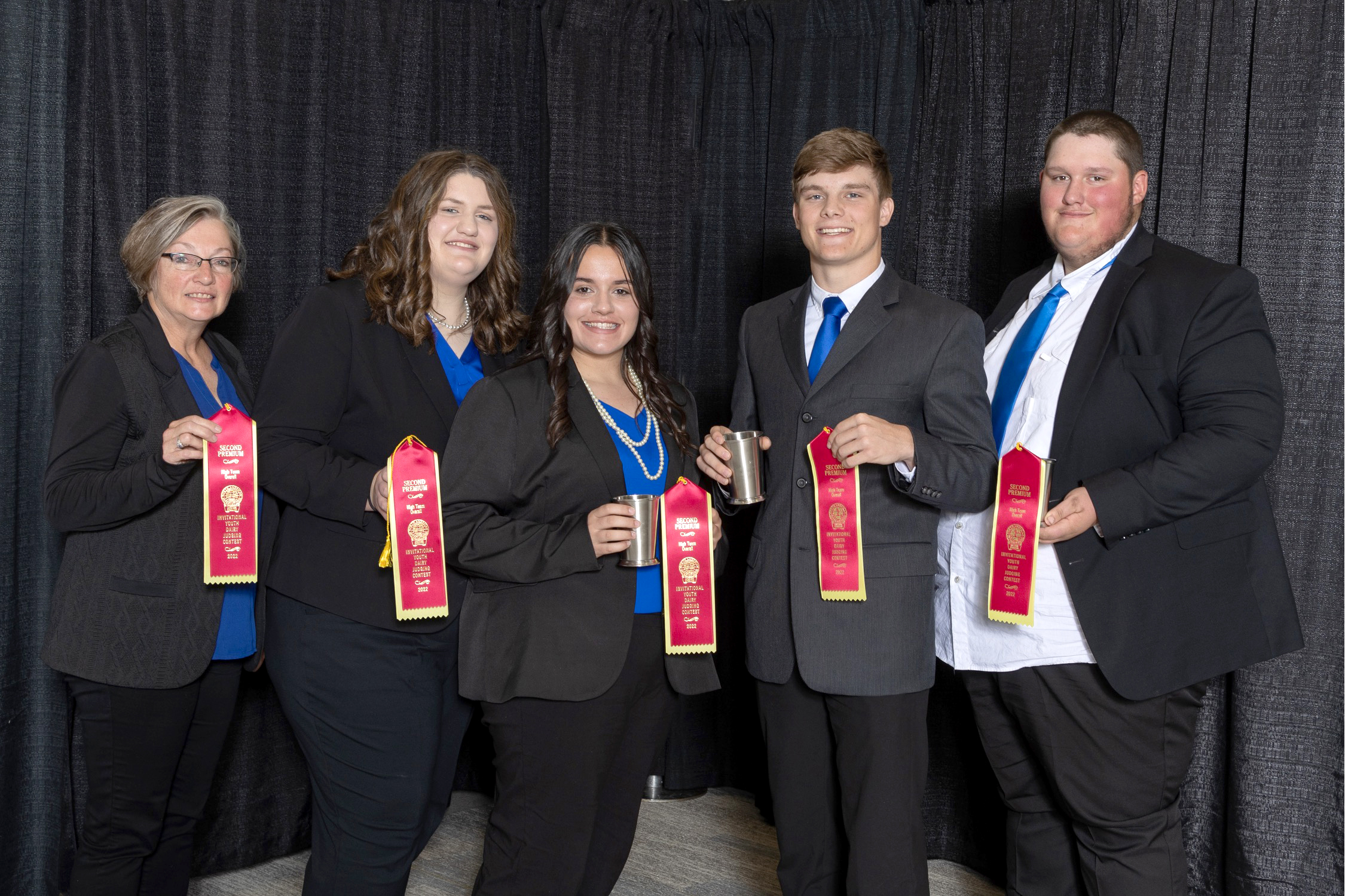 Open Pictured, from left, Missouri 4-H Dairy Judging Team coach Karla Deaver and team members Molly Archer, Libby Shaver, Case Melzer and Logan Archer.