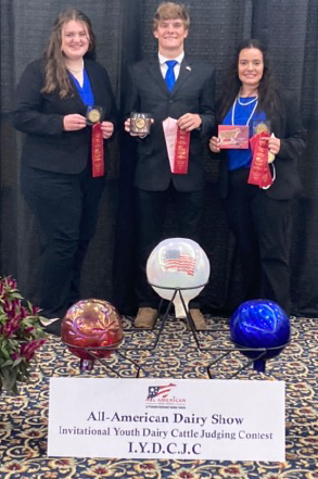 Open Pictured, from left, Missouri 4-H dairy judging team members Molly Archer, Case Melzer and Libby Shaver showing their awards from the All-American Dairy Show Invitational Youth Dairy Cattle Judging Contest in Harrisburg, Pa.
