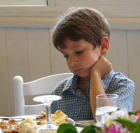 Child picking at his food