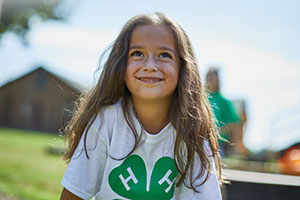 Young girls in a 4-H t-shirt