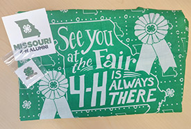 Gifts to members: Missouri 4-H Alumni sticker, lapel pin and bandana