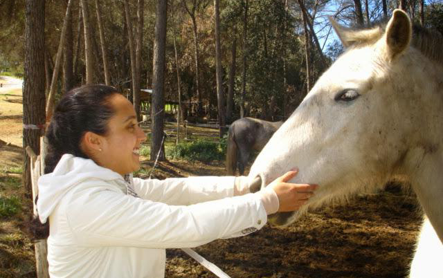 Cecelia Rabell with a horse