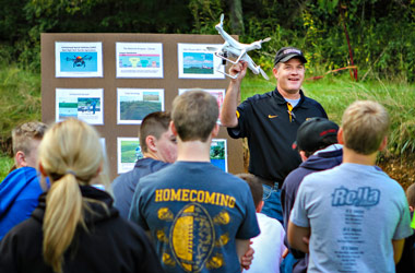 instructor shows drone