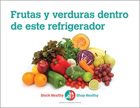 Sign with colorful fruit that reads "Frutas y verduras dentro de este refrigerador."