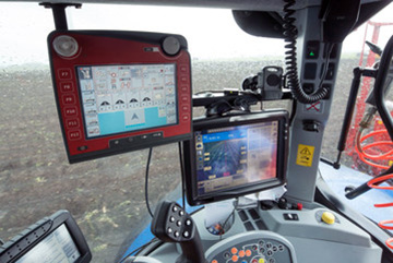 Technology equipment inside a tractor cab.