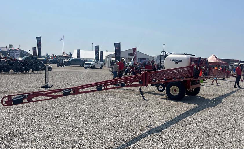 An entry-level air boom spreader used for light fertilizer applications or seeding.