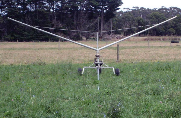 A low-pressure traveling irrigator on pasture. 