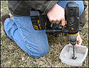 A power drill facilitates sampling in rocky or dry soils.
