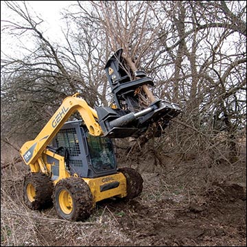 A mature tree being removed to create a field border.