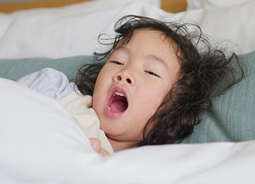 child yawning