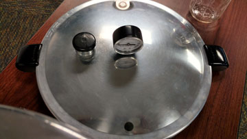 Pressure canner on a table.