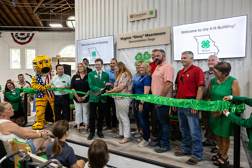 Ribbon cutting at the State Fair for the new 4-H building
