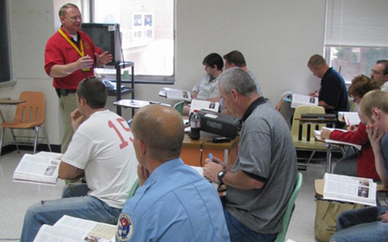 firefighter in a classroom teaching