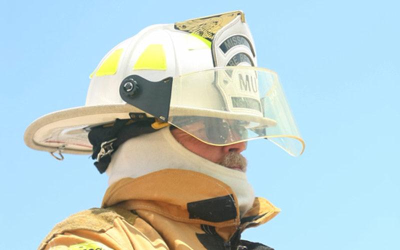 firefighter in a white helmet