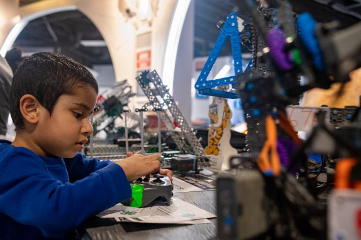 Evan Kshetri visits the robotics table March 7 during University of Missouri Science Center Day in St. Louis.