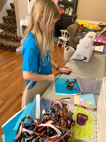 Olivia Buller, 9, member of Cameron Keystones Willing Works 4-H Club, says she got involved because "I enjoy doing something to help others that are helping keep us safe."