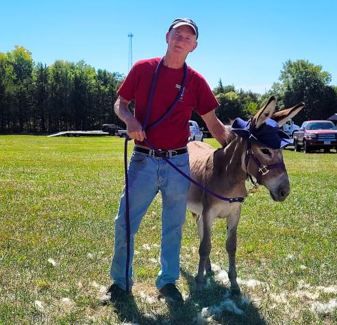 In addition to tending bees, U.S. Army veteran Eric Work is on the advisory board of Peaceful Pastures Donkey Rescue, a Missouri nonprofit that rescues donkeys that are abused, neglected or at risk of slaughter. Photo courtesy of Eric Work.