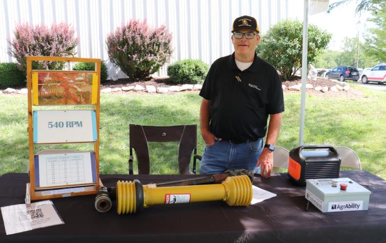 Kent Shannon standing at the table for the Marion County Fair Ag Safety Day.