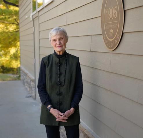 Georgia Morehouse standing in front of the Osher building.