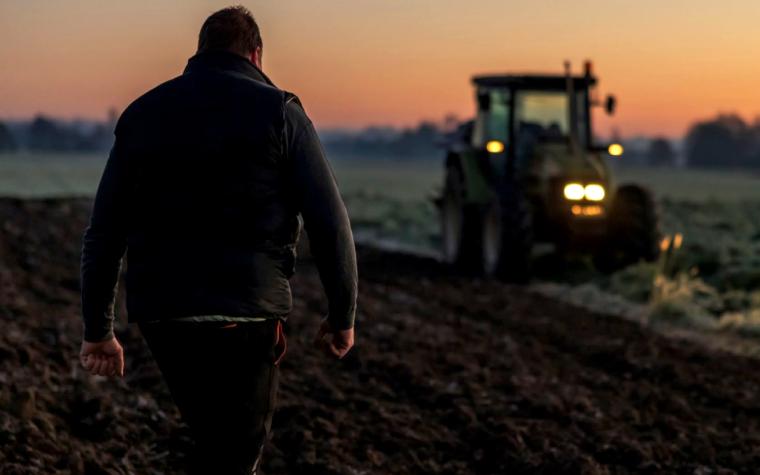 Man approaching a tractor