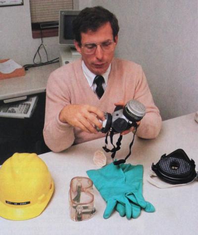 David Baker demonstrating personal protective equipment in a photo from a 1989 issue of Soybean Digest.
