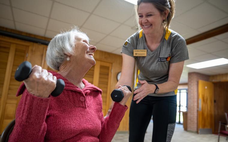 Instructor and participant in "Stay Strong, Stay Healthy" class