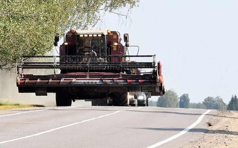 Large farm equipment on public road