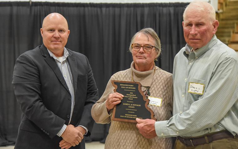 Dairy Cattle Breeder Award winners Novalee Coats, center, and James Coats, right, with David Gunter, left, president of Missouri Dairy.