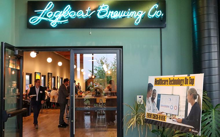 Sign for Healthcare Technology on Tap outside Logboat Brewing.