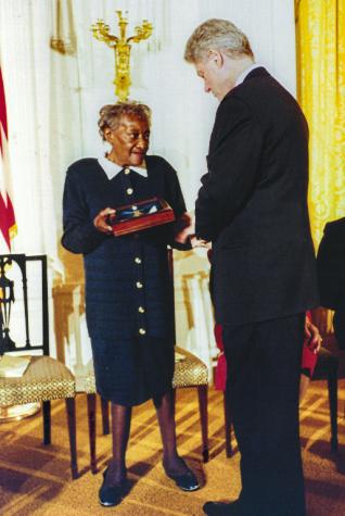 Valcenie James and Bill Clinton