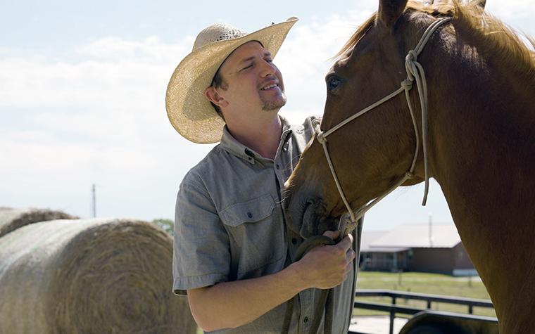 Volkmann smiling at horse