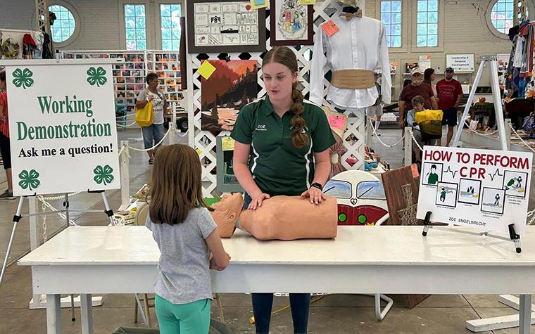 Zoe Engelbrecht demonstrating CPR