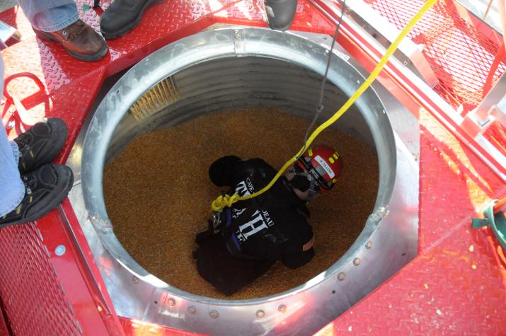An MU FRTI instructor descends into FRTI's mobile grain engulfment rescue training simulator.Photo by Jason Vance