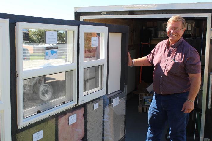 University of Missouri Extension specialist Bob Broz  shows how to save money  using a new mobile energy education unit.  The classroom on wheels helps users view different types of doors, windows, insulation and lighting.Linda Geist
