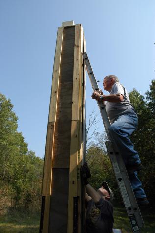 Robert McArthur (top) and Vanessa Melton of the Missouri Master Naturalist Boone’s Lick chapter work on a shelter for chimney swifts at the Audubon Society’s Wild Haven Nature Area near Columbia. University of Missouri Cooperative Media Group