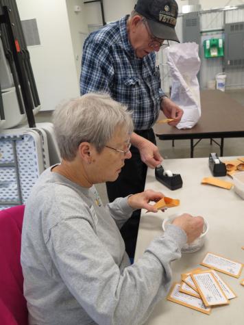 Pat Miller and Dayton Shepherd are among the many Master Gardener and Grow Well Missouri partners who volunteer at the Mexico Help Center. MU Extension Master Gardeners and community volunteers sort and package bulk seeds to give to food pantry clients whPhoto by Linda Geist