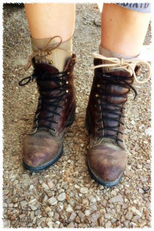 Portell wears sturdy lace-up boots over braces